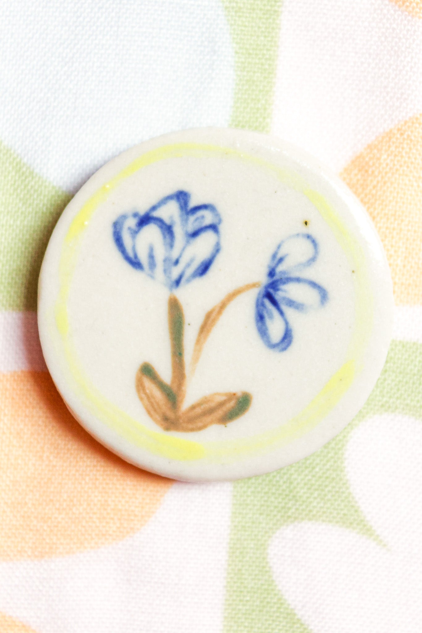 Lila Round Ceramic Magnet in Blue/Green Flower