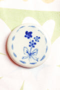 Lila Round Ceramic Magnet in Blue Bow