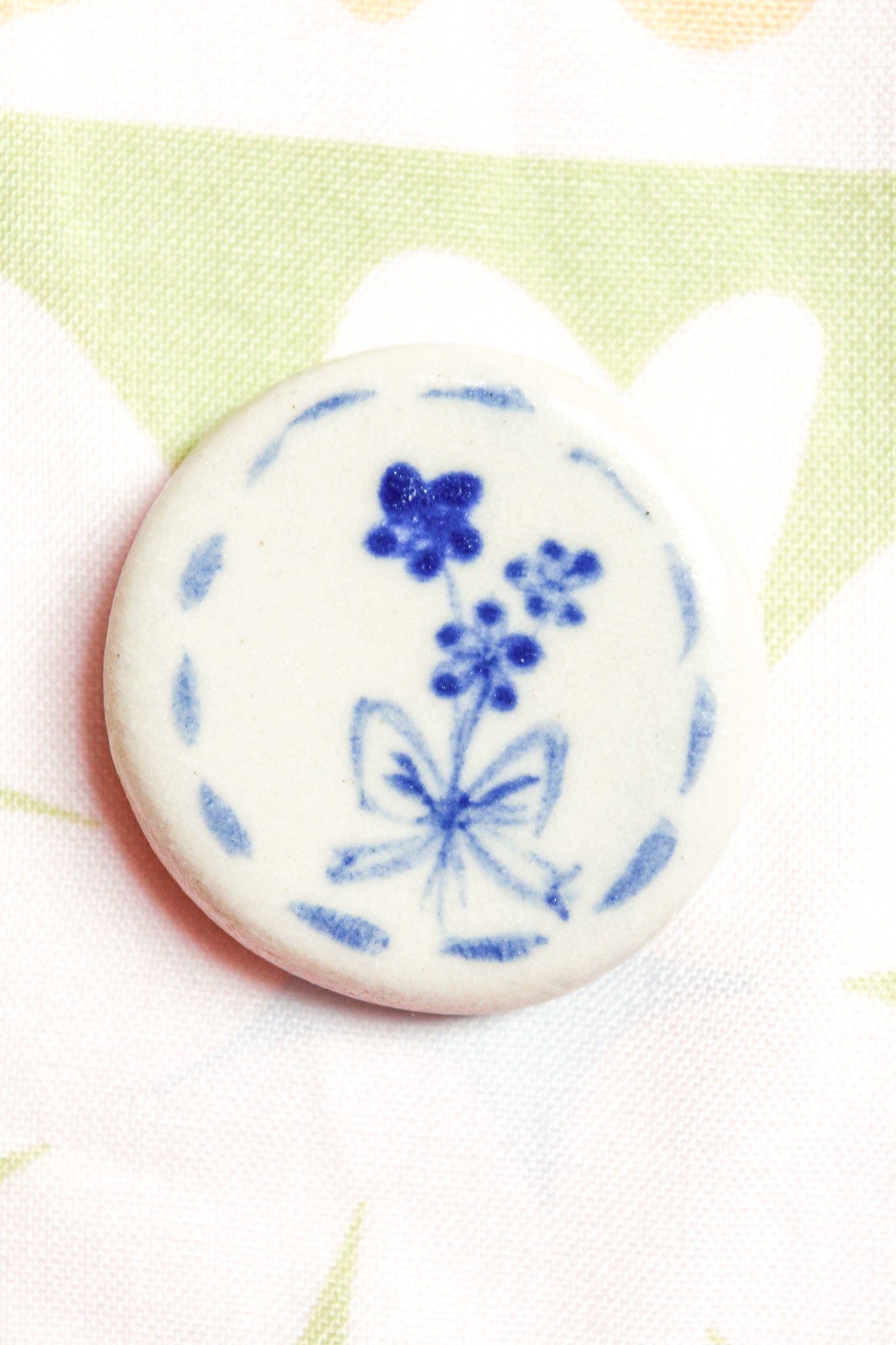 Lila Round Ceramic Magnet in Blue Bow