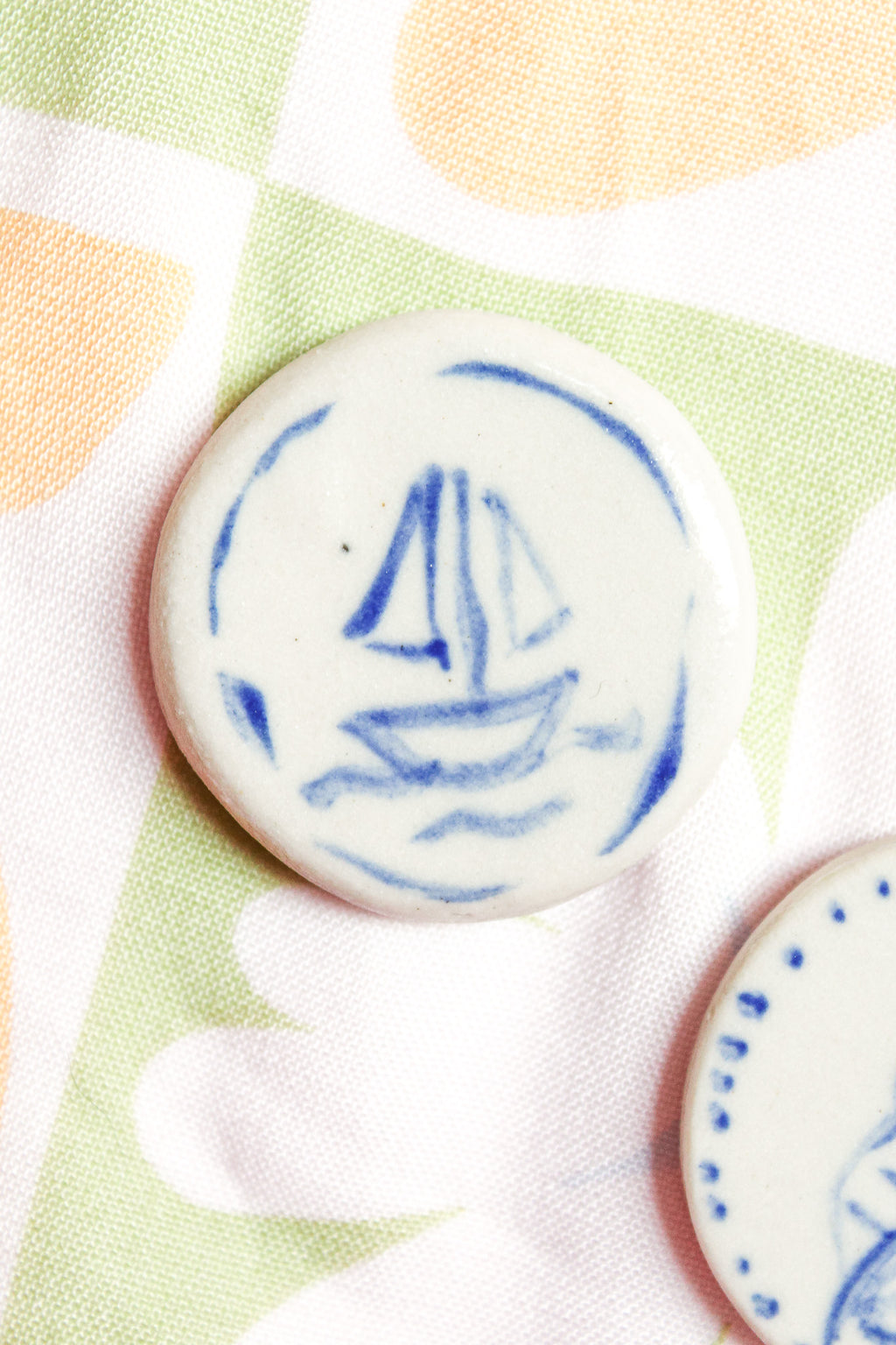 Marina Round Ceramic Magnet in Blue Sailboat