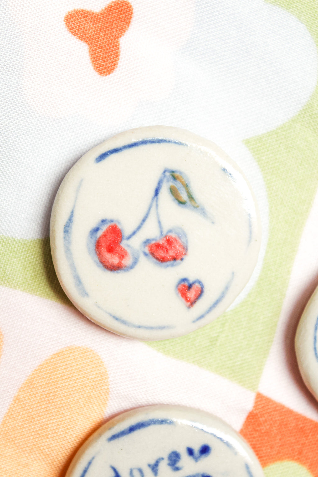 Lulu Round Ceramic Magnet in Red Cherry