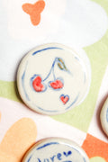 Lulu Round Ceramic Magnet in Red Cherry